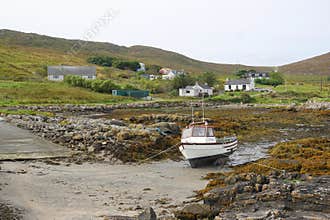 Boat at low tide on Scottish island