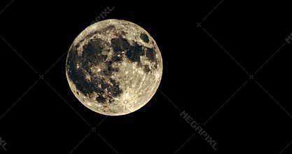 Background video of a close-up of the moon moving across the sky.