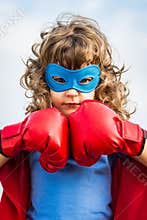 Superhero kid. Girl power concept