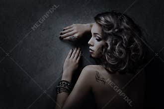 Woman hairstyle portrait over dark background