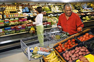 People shopping for produce.