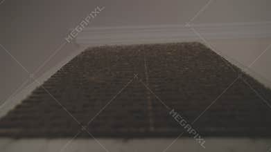 Clogged air filter accumulates dust and debris, highlighting the need for regular cleaning and maintenance