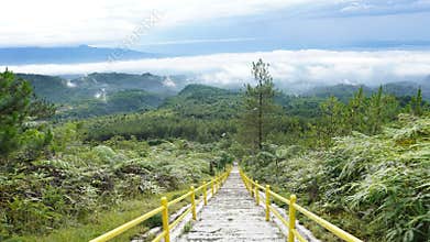 down the very long and tiring yellow stairs. Photo hunting on Mount Galunggung, Tasikmalaya