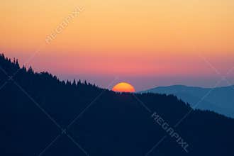 Sunrise sky over the Dragobrat in Carpathian mountains