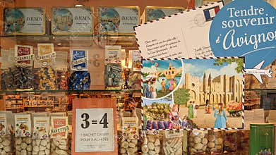 Avignon, Provence-Alpes-CÃ´te d\'Azur, France - April 15, 2023: Souvenir shop window with local candies and Avignon-themed