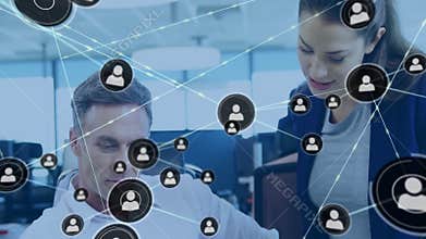 Animation of network of connections with people icons over diverse business people in office