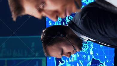 Workplace of the air traffic controllers in the control tower. Team of professional aircraft control officers works