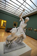 Man fighting a beast