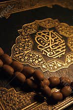 Holy Koran book & rosary