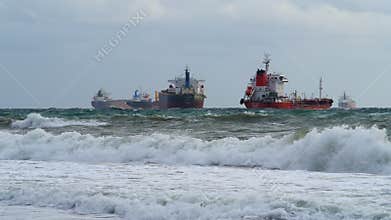 Dry-cargo freighters are in harbor. Bulk carriers