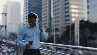 African American Man Enjoying Music in the City