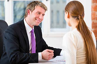 Lawyer and client in office
