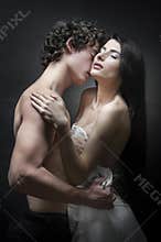 Young couple in love on their wedding night