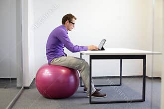 Bad sitting posture at tablet