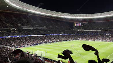atmospheric football game at the night time