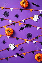 Happy Halloween concept with bunting, ghosts, pumpkins, web, bats, spiders on purple background