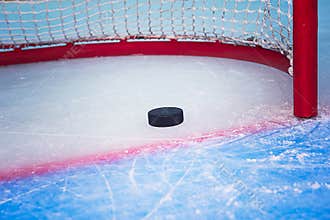 Hockey puck crossing goal line