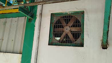 Exhaust fans are installed on the walls of buildings