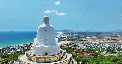 Aerial view of giant Buddha Statue on top of the mountain overlooking the sea Central Vietnam