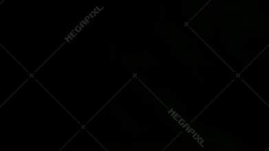 Hands in front of an black background giving applause