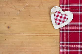 Greeting card with checkered red and white heart for Christmas o