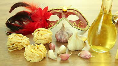 Fresh italian food ingredients with Venetian mask
