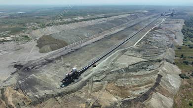 Top shot of a large bucket-wheel excavator in a lignite (brown-coal) mine. ?erial view.