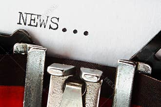 News text on retro typewriter