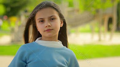 Pretty little kid outdoor portrait young girl cute happy healthy child female teen schoolgirl daughter holiday