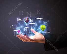 Letters and balloons in the hand of a businessman