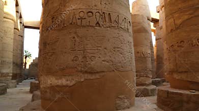 columns in karnak temple with ancient egypt hieroglyphics