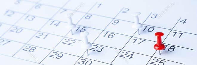 Business Concept, Appointments, Tacks Marking Dates On Calendar