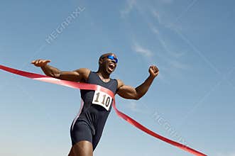 Male Runner Winning Race