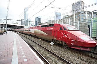 Red eurostar train at the Rotterdem Central Station