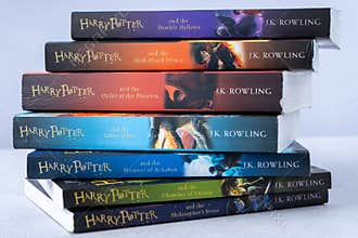 A stack of books about Harry Potter by writer JK Rowling. Collection book. Ukraine, Kyiv - January 26, 2024.