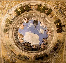 Trompe loeil oculus in the center of the vaulted ceiling of the Camera degli Sposi. Ducal Palace of Mantua, Italy