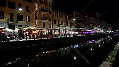 Night Scenes - Ancient arched bridge over the Navigli of Milan