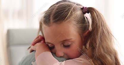 Mother hugs daughter showing love and support to child