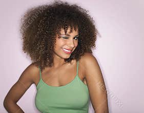 Afro Woman With Curly Hair Winking