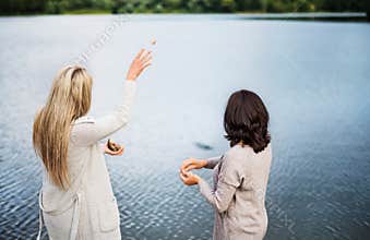 Women standing together in a closing circle