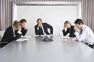 Serious Business People On Conference Call