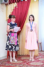 Two women with medals The best kindergarten