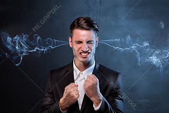 Businessman smoking with anger
