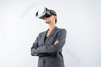 Caucasian businesswoman crossing arms while wearing VR glasses. Contraption.