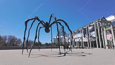 Huge spider sculpture in front of the National Gallery of Canada in Ottawa - OTTAWA, ONTARIO - APRIL 17, 2024