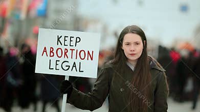 Feminist girl hold keep abortion legal protest banner female right demonstration