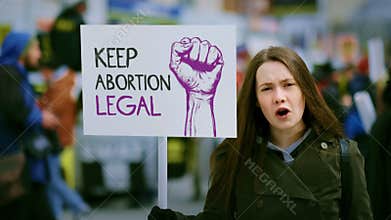 Keep abortion safe and legal protest banner. Feminist women rights demonstration