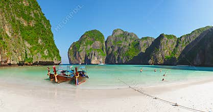 Tropical beach with boats and rocks. Thailand, Phi Phi