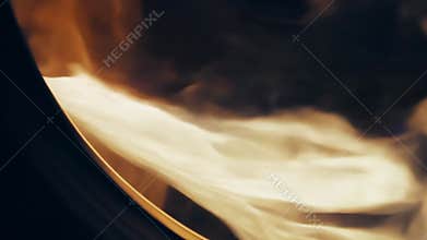 The afterburner flames sizzle and crackle in a controlled chaos consuming all oxygen in its path and creating a powerful