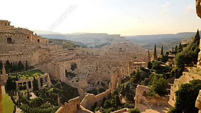 Ancient cave view overlooking scenic landscape in israel at sunset